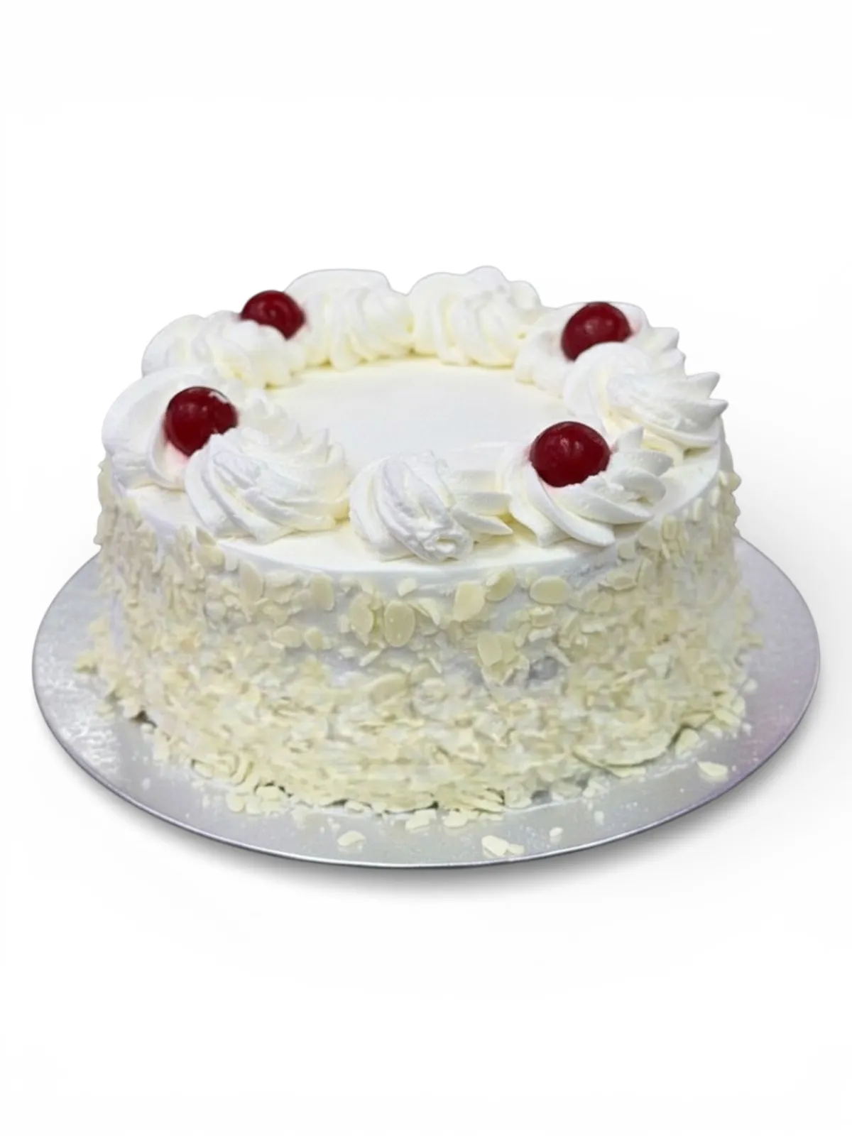 A layered White Forest eggless cake from Num Num's Bakery, popular with Cherrybrook families for milestone celebrations